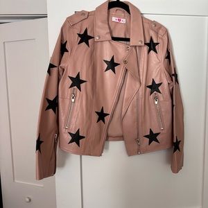Pink leather jacket with black patch stars